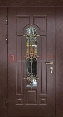 Темная железная дверь со стеклом и ковкой для частного дома ДСК-156 в Щелково