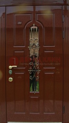 Красивая металлическая дверь со стеклом и ковкой ДСК-33 в Щелково