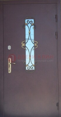Металлическая дверь со стеклом и ковкой ДСК-77 в панельный дом в Кубинке